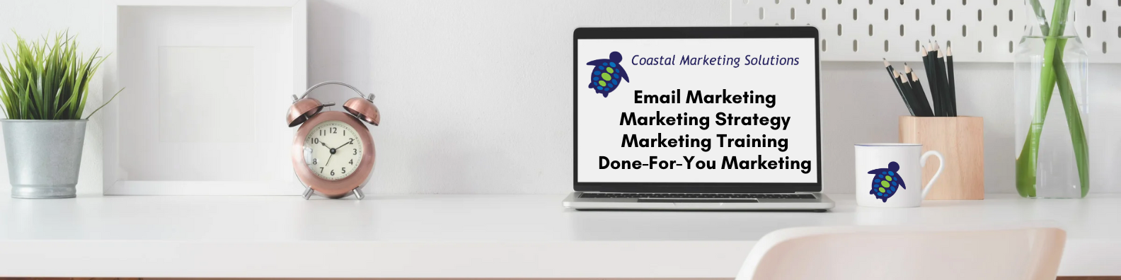 laptop displaying Coastal Marketing Solutions: Email Marketing, Marketing Strategy, Marketing Training, Done For You Marketing
